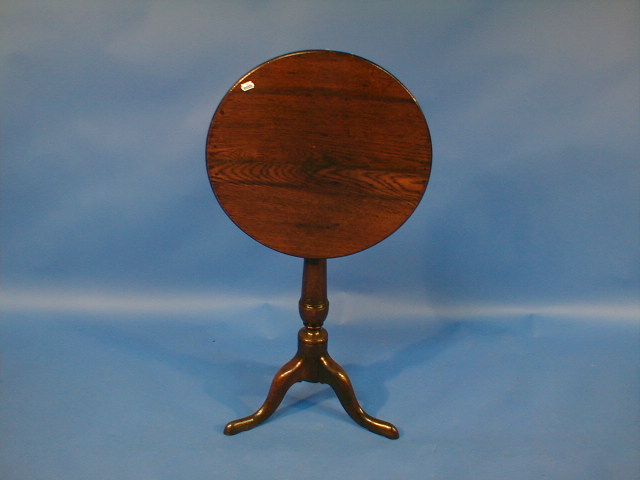 Appraisal: A Georgian oak tripod pedestal table with a circular tilt