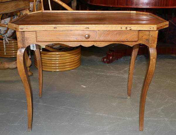 Appraisal: A Louis XV Provincial leather top tea table height in