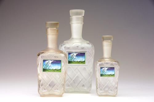 Appraisal: GEORGES DELHOMME Lavandes a group of three perfume bottles for