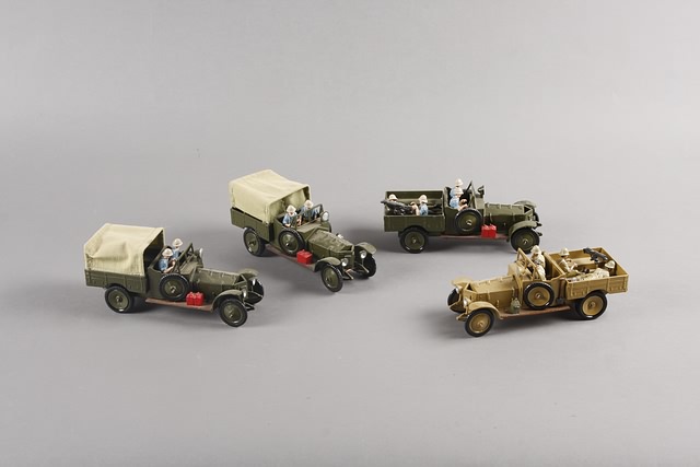 Appraisal: Lot of military vehicles and figures all metal representing British