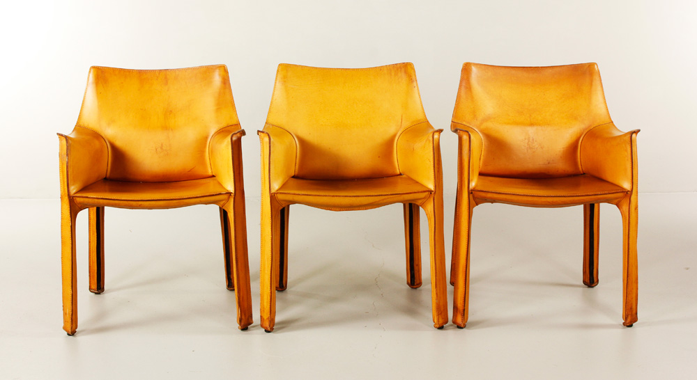 Appraisal: - Cassina Armchairs Three Cassina armchairs leather h x w