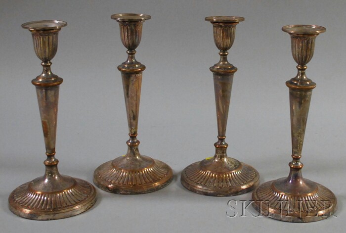 Appraisal: Set of Four Neoclassical-style Silver-plated Candlesticks ht in