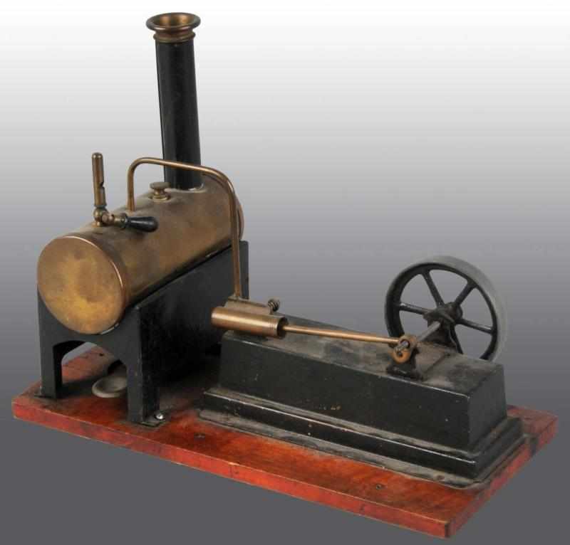 Appraisal: Carette Horizontal Steam Engine Description Includes the original smokestack whistle