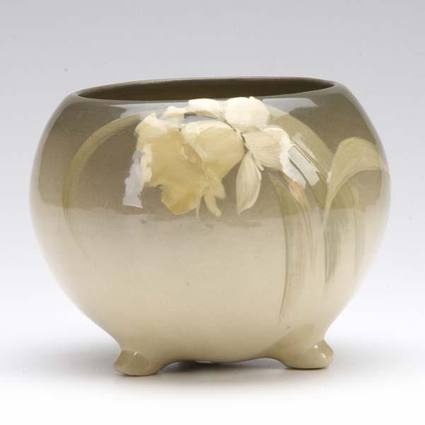 Appraisal: ROSEVILLE Rozane footed planter painted with daffodil Small chip and