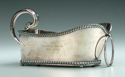 Appraisal: Silver plated wine bottle basket boat form C-scroll handle gadroon