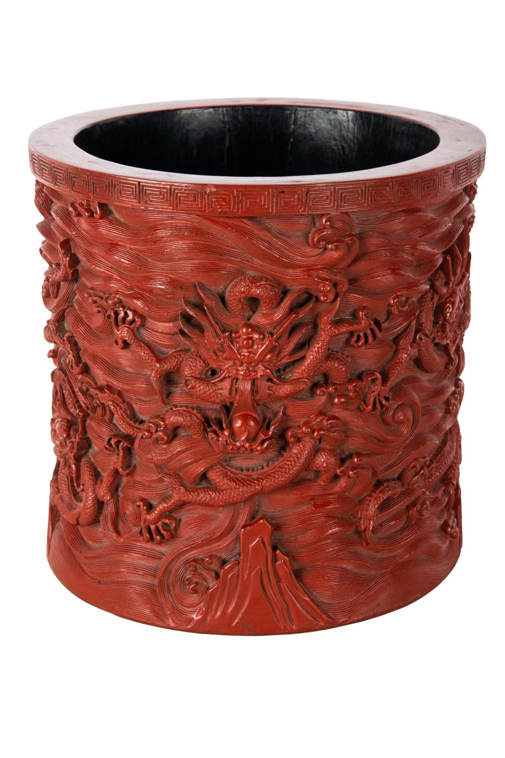 Appraisal: CHINESE CARVED CINNABAR BRUSH POTwith dragon motif inches diameter inches