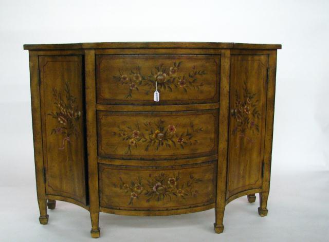 Appraisal: A Bow Front Floral Motif Console with three Drawers flanked