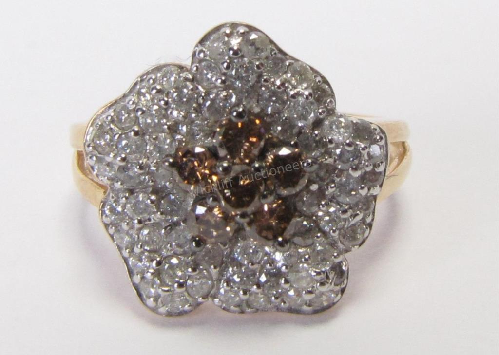 Appraisal: A K yellow and white gold fashion ring with sixty