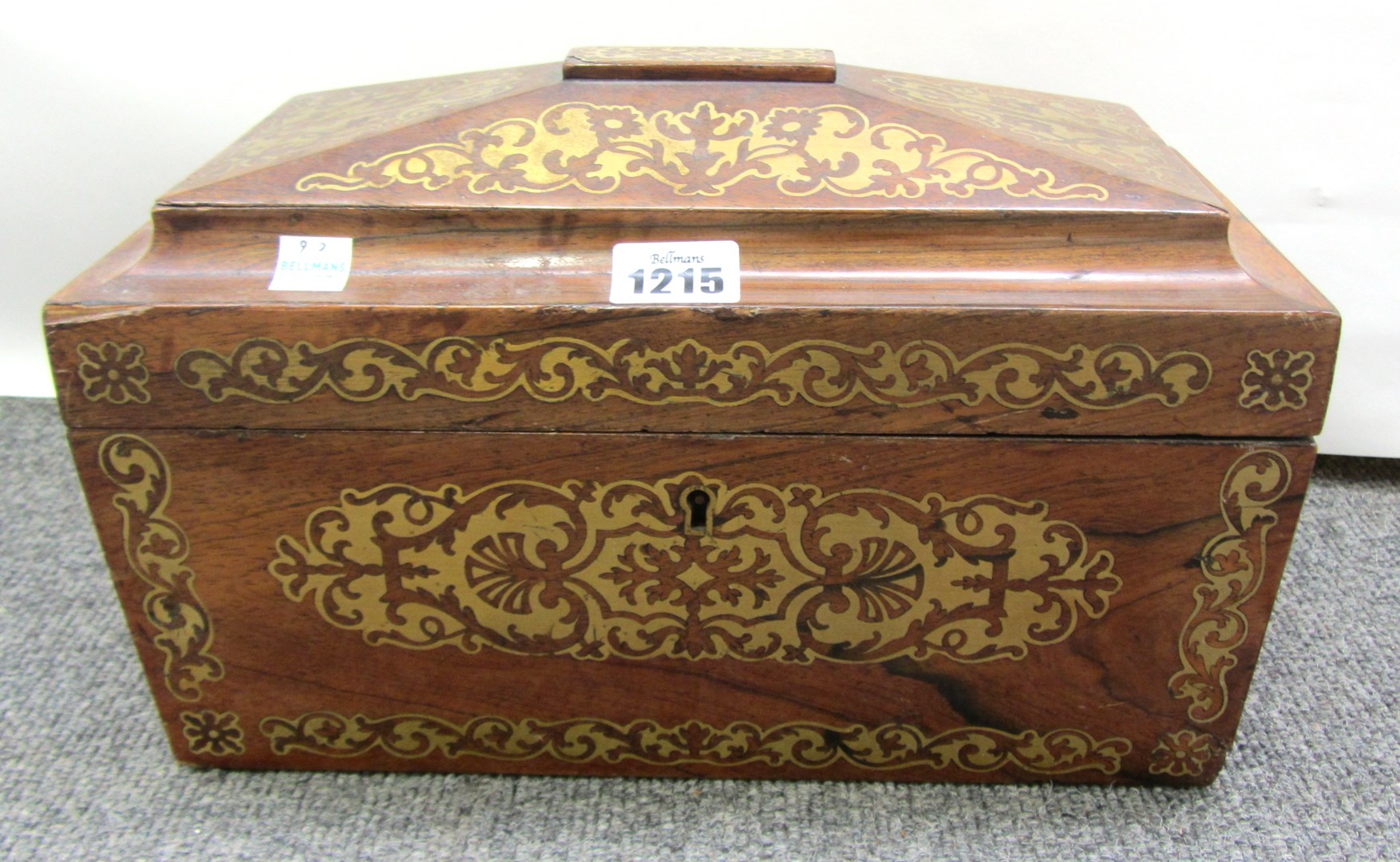 Appraisal: A Regency brass inlaid rosewood sarcophagus tea caddy cm wide