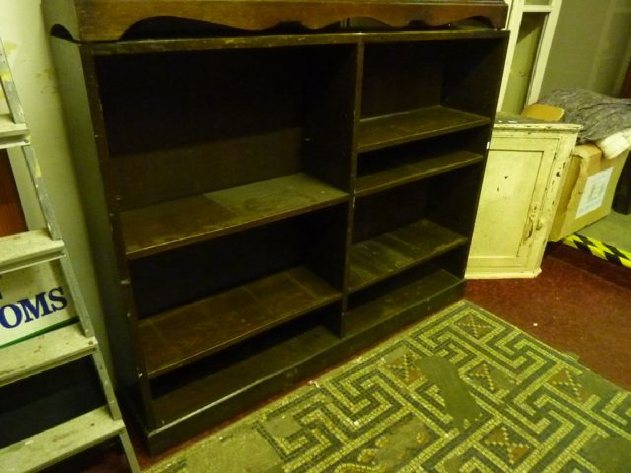 Appraisal: An oak freestanding open bookcase with segmented adjustable shelves raised