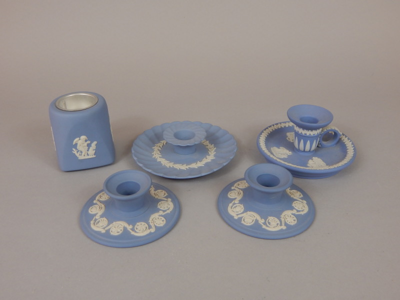 Appraisal: Five Wedgwood blue Jasperware candlesticks to include two chambersticks a