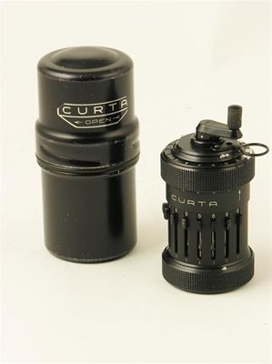 Appraisal: A Curta Type I calculator No by Contina in container