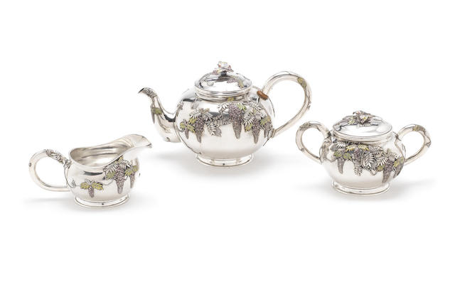 Appraisal: An impressive Japanese Meiji period silver and enamel three-piece tea