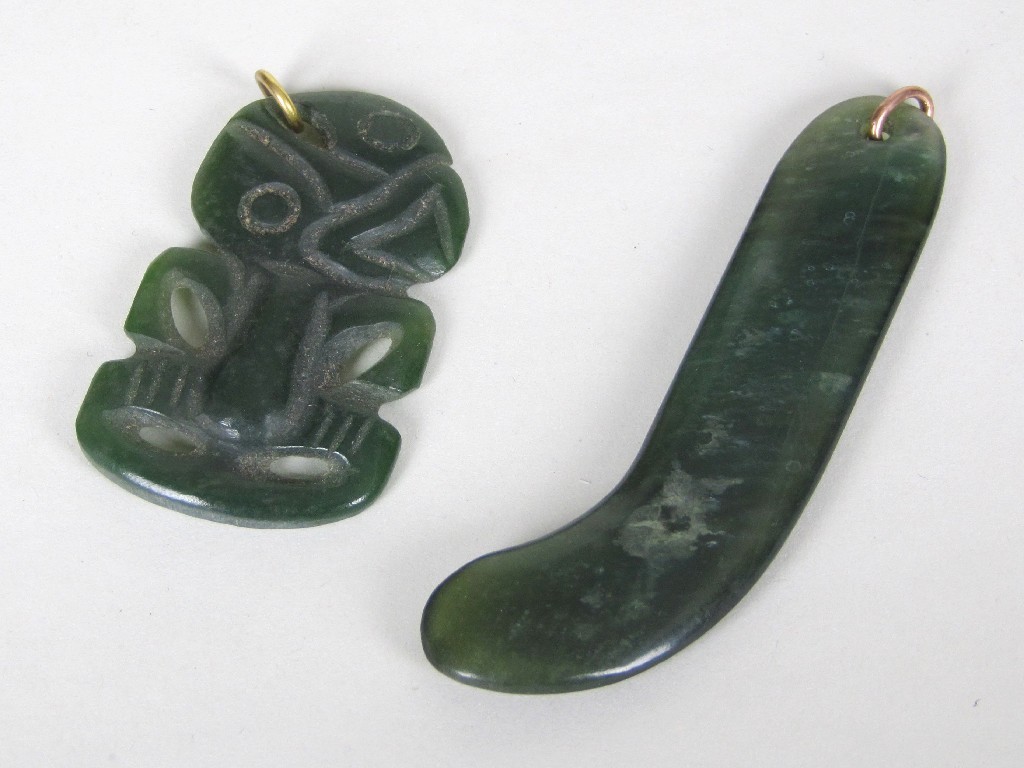 Appraisal: A carved jade Tiki pendant cm high and another jade