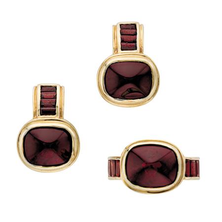 Appraisal: Pair of Gold and Cabochon Garnet Earrings and Ring Estimate