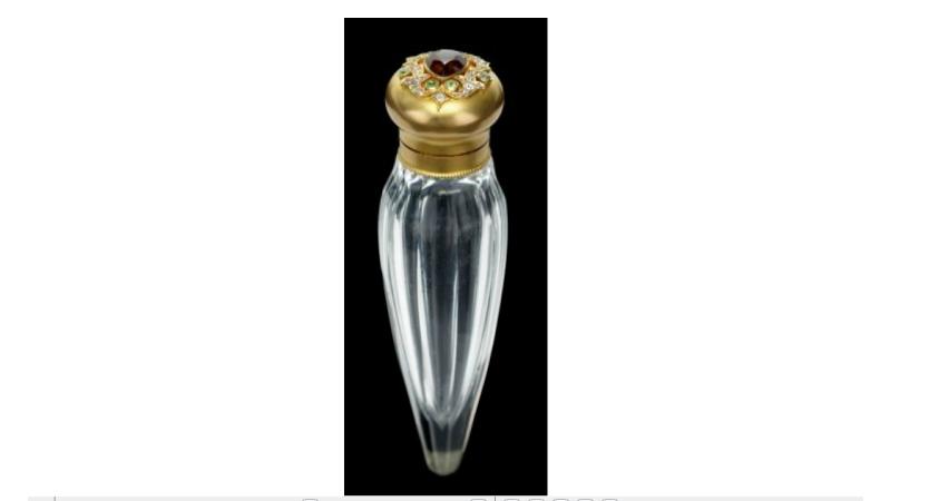 Appraisal: k gold and diamond mounted perfume flaskWith fluted sides the