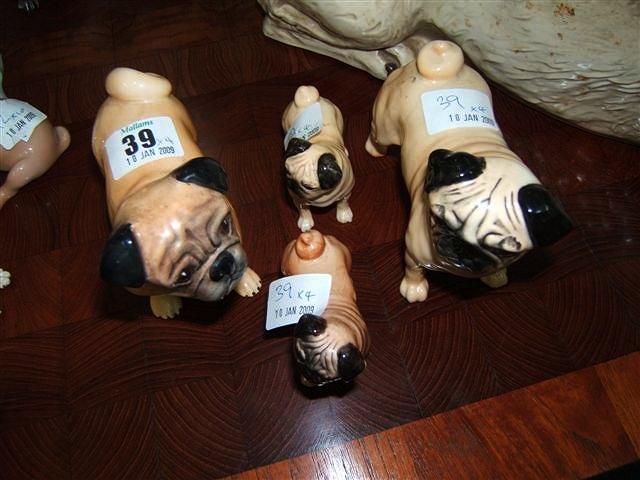 Appraisal: Three various Beswick pug dogs and a Sylvac pug dog