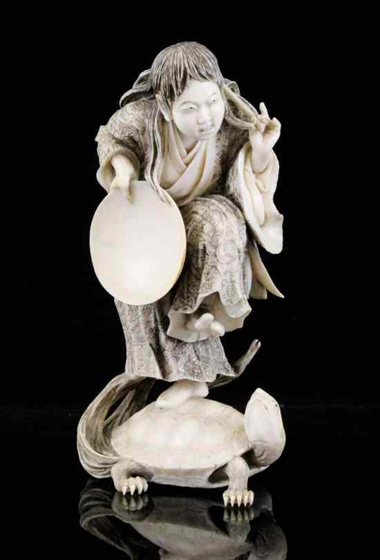 Appraisal: A Japanese ivory figure of Urashima Taro Meiji period -