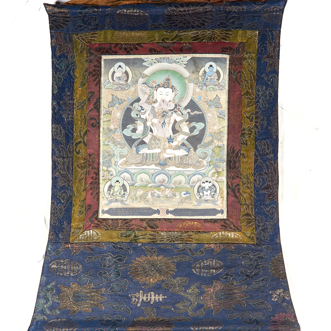 Appraisal: TIBETAN THANGKA Tibetan thangka depicting Vajrasattva and consort seated on