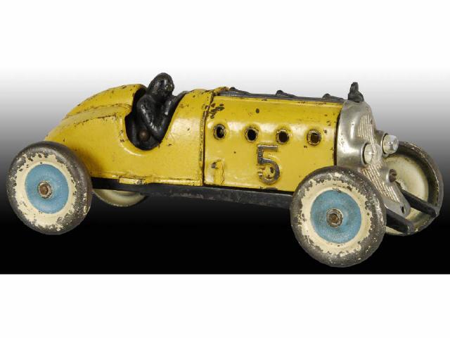 Appraisal: Cast Iron Hubley Number Yellow Racer Car Toy Description Very