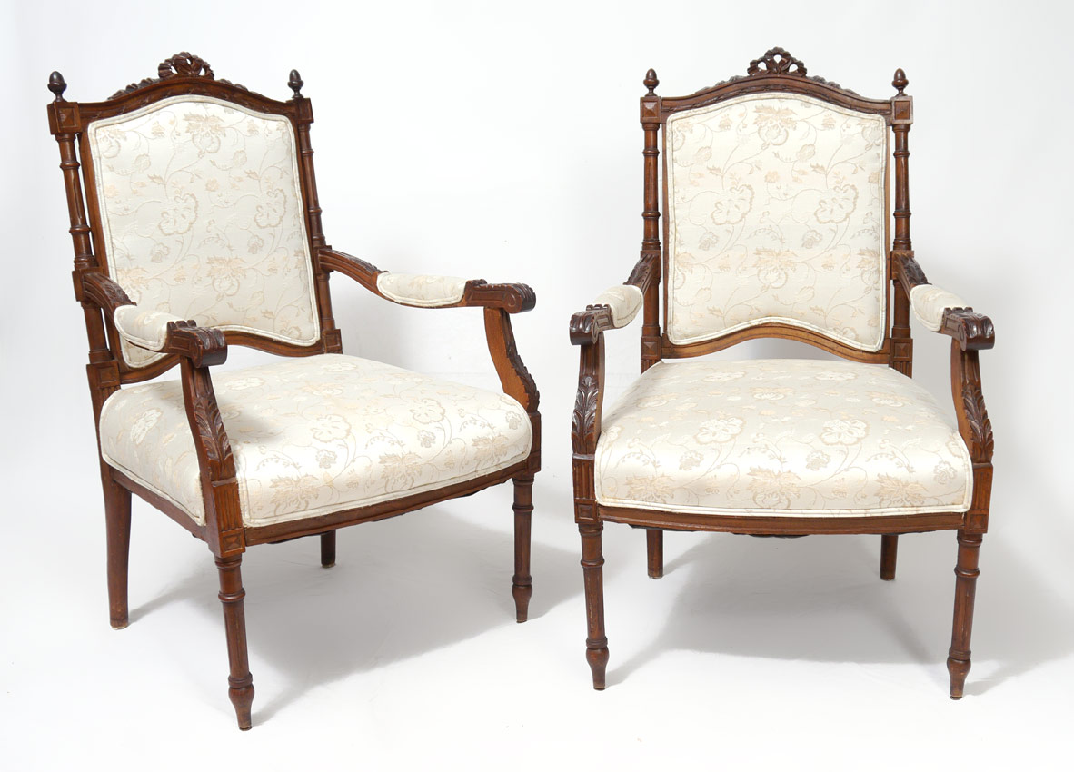 Appraisal: PAIR LOUIS XVI STYLE FAUTEUIL CHAIRS Carved crest with turned