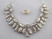 Appraisal: A white metal tests silver freshwater pearl collar necklace with