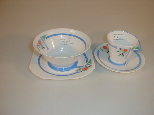 Appraisal: A Shelley china Mode trio painted with flower and berry