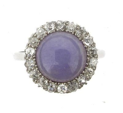 Appraisal: A mauve stone and diamond cluster ring The circular cabochon