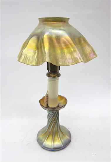 Appraisal: TIFFANY SIGNED ART GLASS CANDLE LAMP gold iridescent shade with