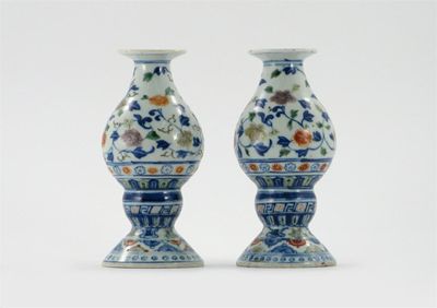 Appraisal: A pair of Chinese pear-shaped vases or candlesticks of Islamic