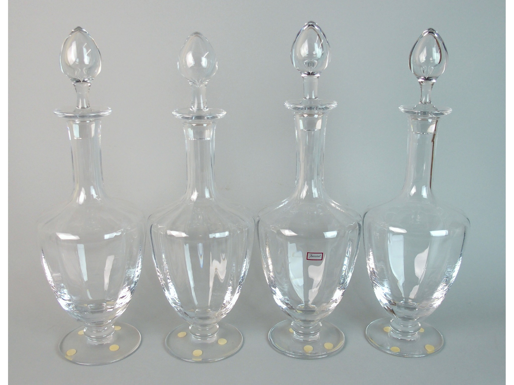 Appraisal: Four Baccarat crystal 'Capri' wine decantersribbed body and neck with