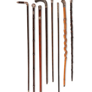 Appraisal: A Collection of Eight Silver and Silvered Metal Canes and