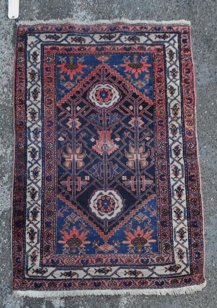 Appraisal: Persian Rug long wide Has some bare spots at center