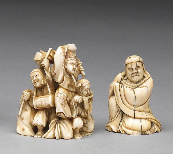 Appraisal: Two ivory okimono The first Edo Period and portraying the