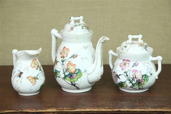 Appraisal: THREE PIECE LIMOGES TEA SET All with handpainted floral decoration