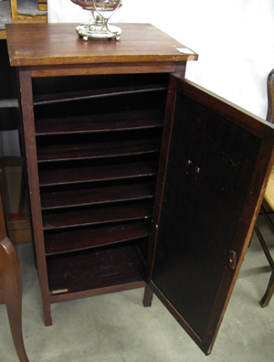 Appraisal: A TALL MAHOGANY MUSIC CABINET American c the plain panel