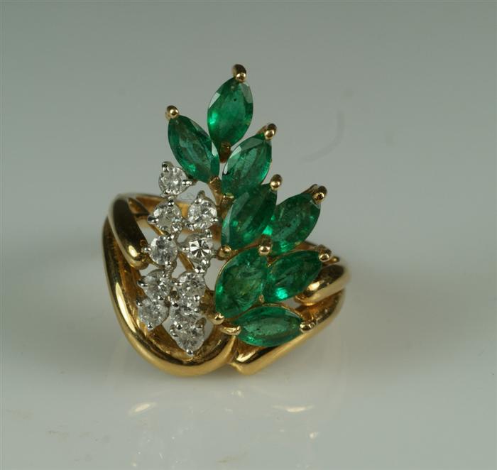 Appraisal: K YG diamond and emerald cocktail ring size dwt total