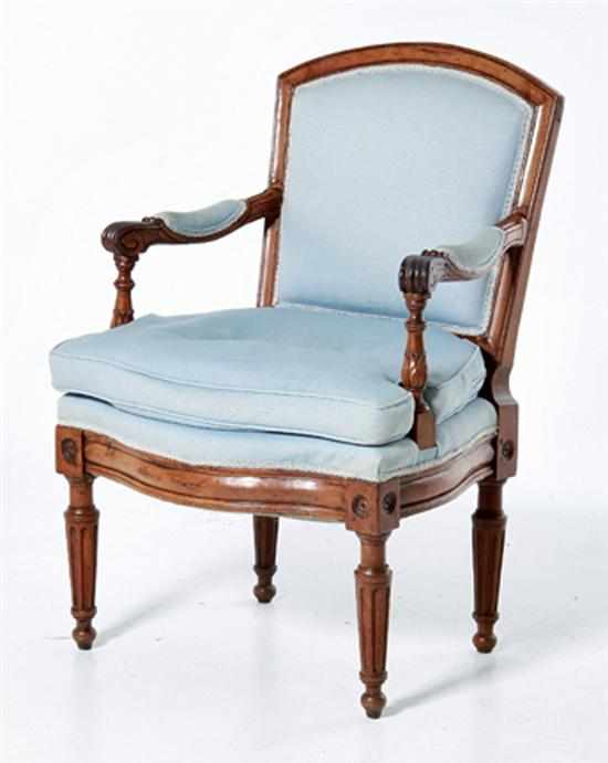 Appraisal: Louis XVI carved fruitwood bergere late th century shaped and