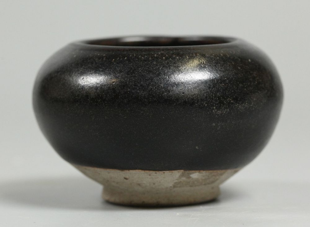 Appraisal: Chinese pottery bowl possibly Song dynasty dark brown glazed pottery