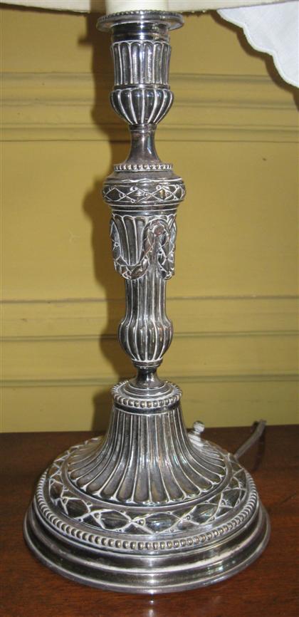 Appraisal: Pair of silver plated candlesticksConverted to lamps