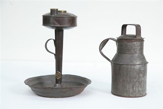 Appraisal: TWO PIECES OF EARLY TINWARE Includes an unusual lamp with