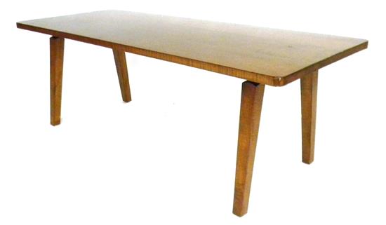 Appraisal: Coffee table th C tiger maple oblong top with rounded