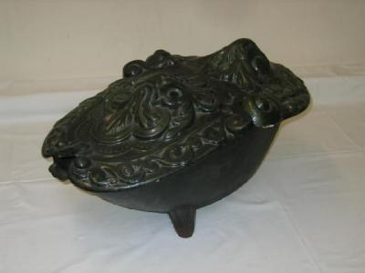 Appraisal: A FRENCH CAST IRON COAL SCUTTLE of oval form with