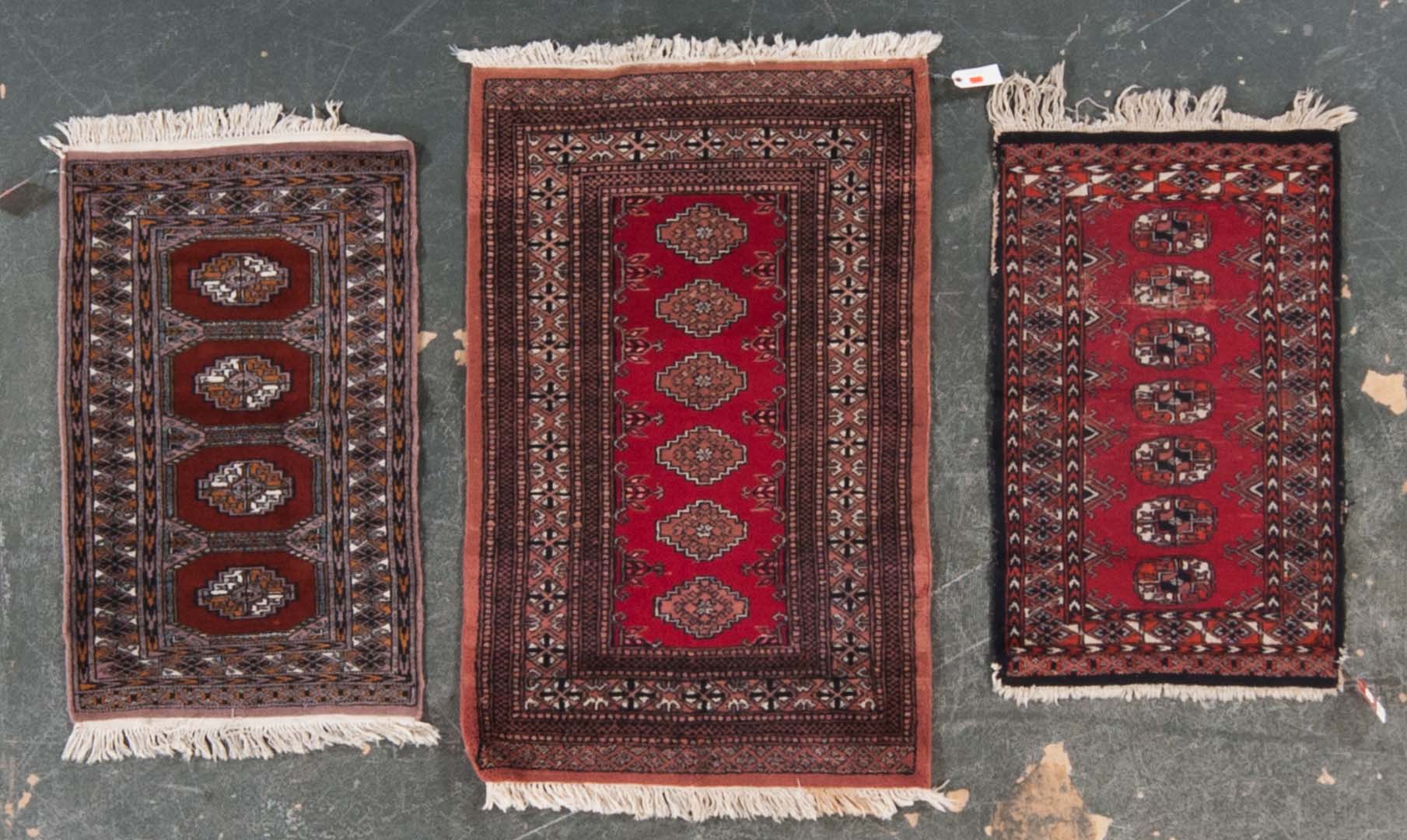 Appraisal: Three Pakistani Bohkara rugs Pakistan modern Sizes are x x