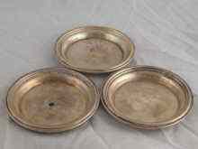 Appraisal: A set of four white metal tests silver wine glass