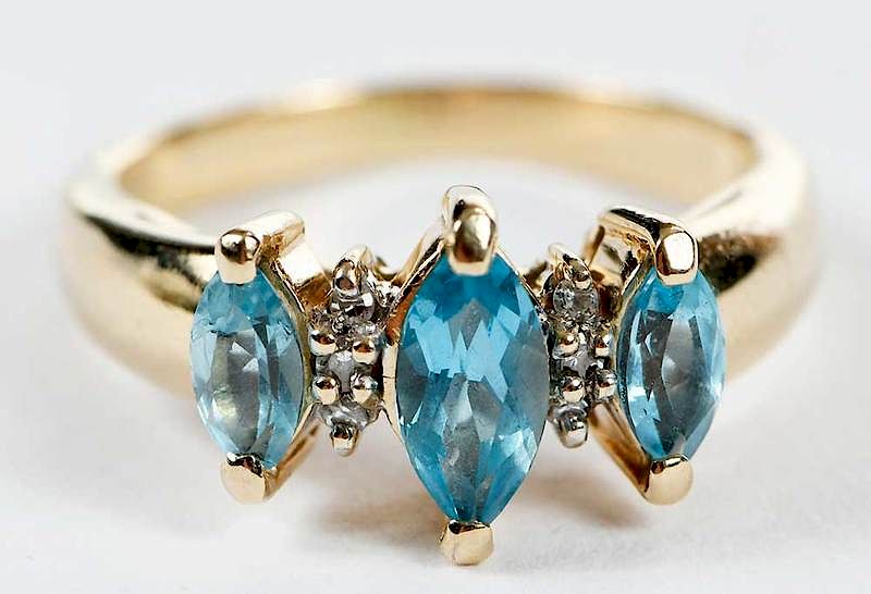 Appraisal: kt Gold and Gemstone Ring three marquise blue topaz six