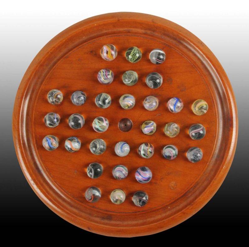 Appraisal: Marble Solitaire Board with Handmade Marbles Condition Near Mint Plus