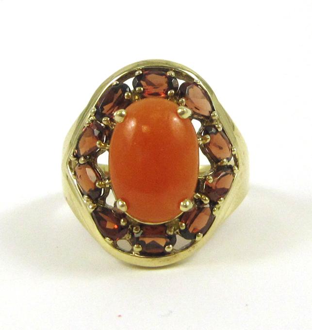 Appraisal: ORANGE JADE GARNET AND YELLOW GOLD RING The k yellow