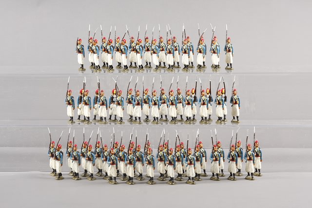 Appraisal: Duplicate lot of metal French Turco's marching at shoulder arms