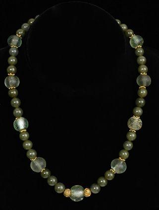 Appraisal: GREEN STONE AND GLASS BEAD NECKLACE in Provenance Property from